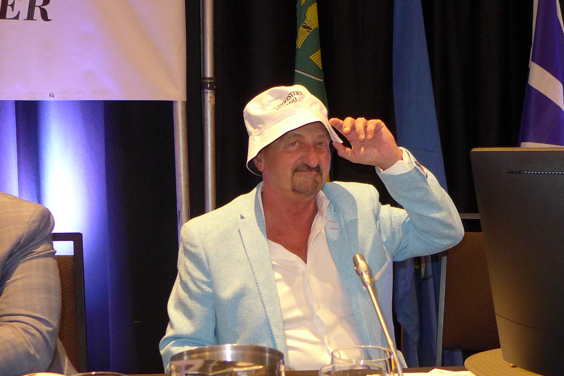 Shane O'Brien wearing the hat given by the region