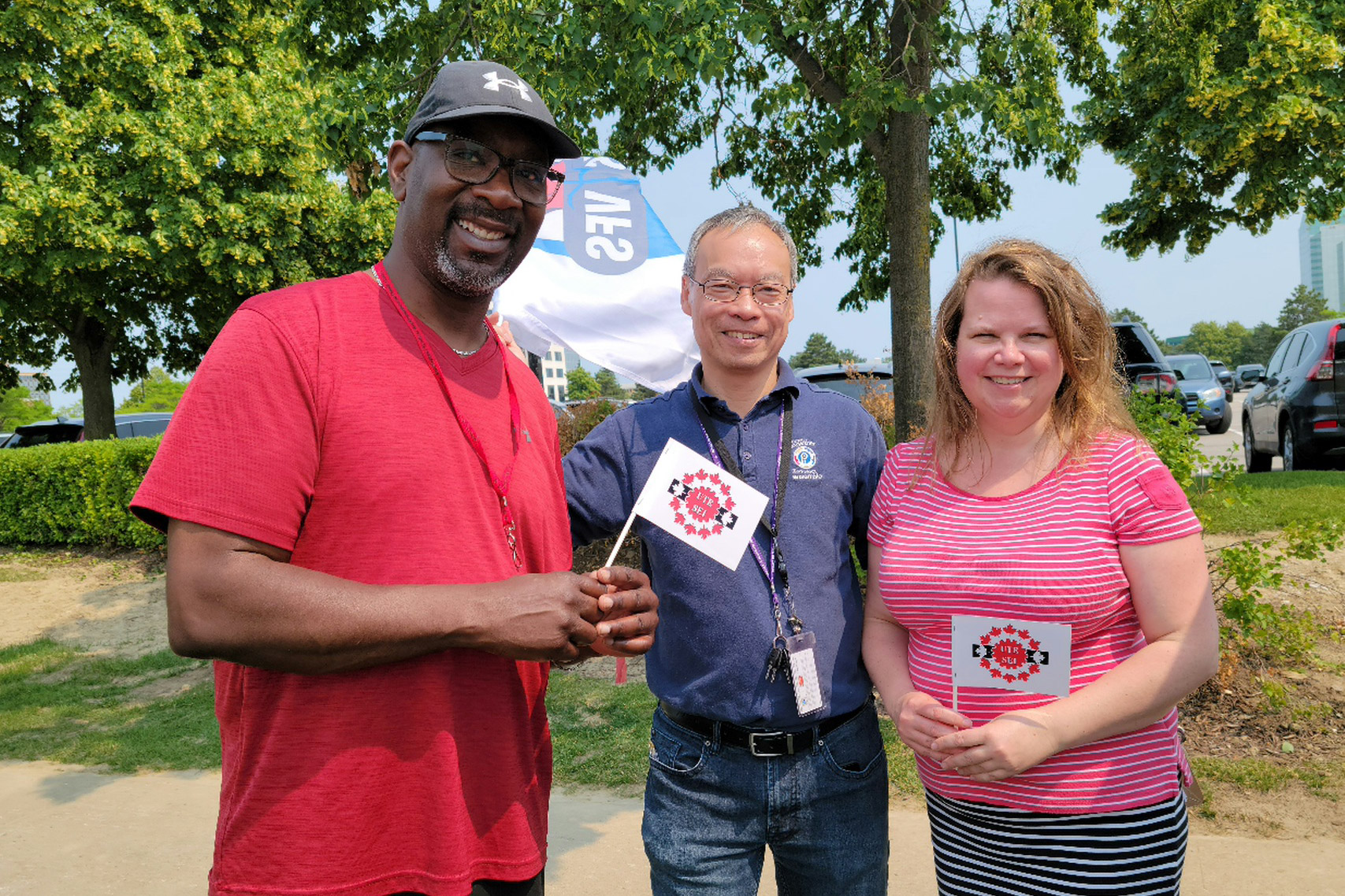 Selby Hewitt with two members