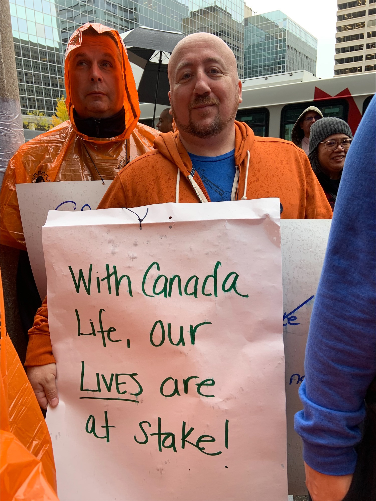 Kevin Welgush with sign