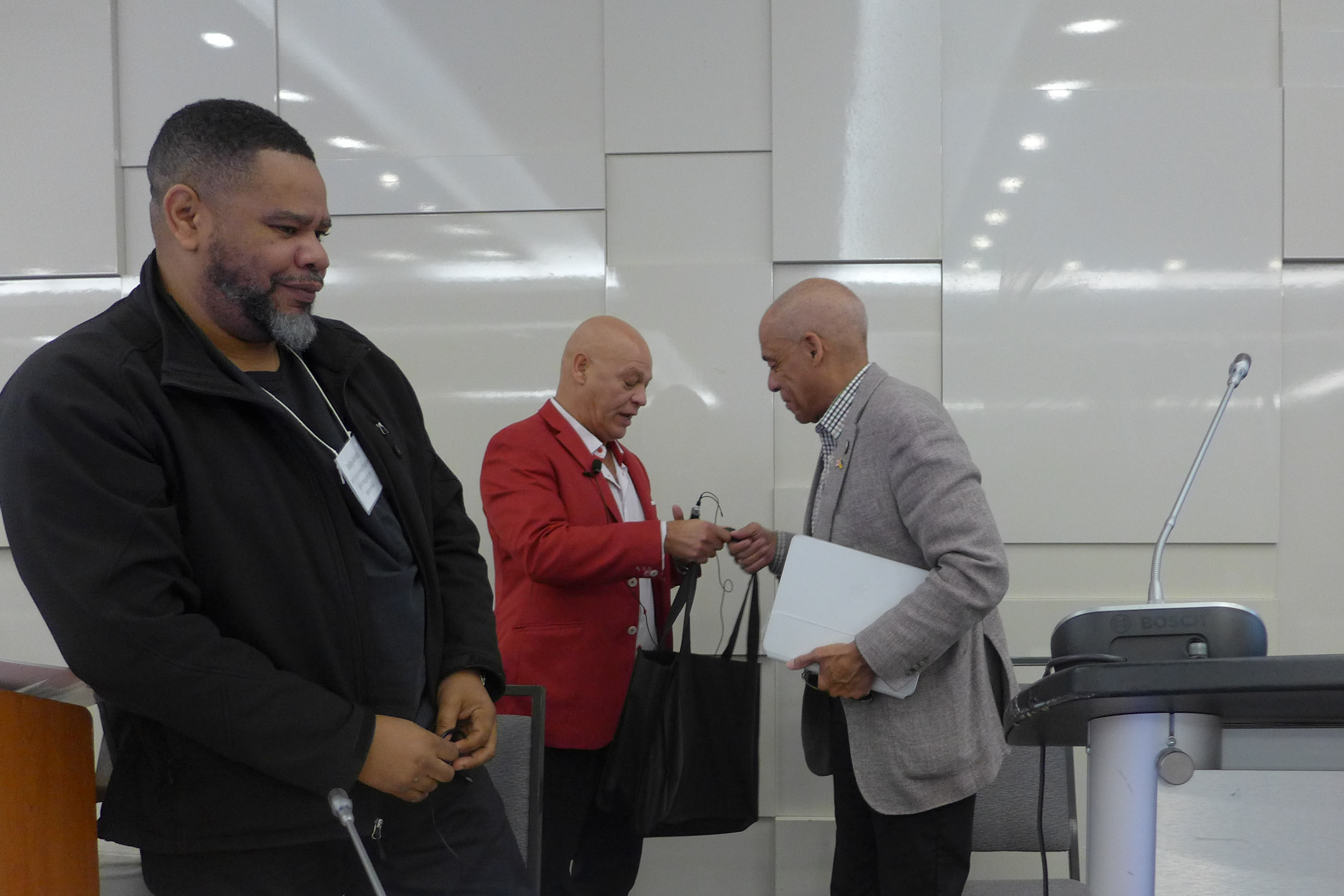 Larry Rousseau receives a thank-you gift from Doug Gaetz