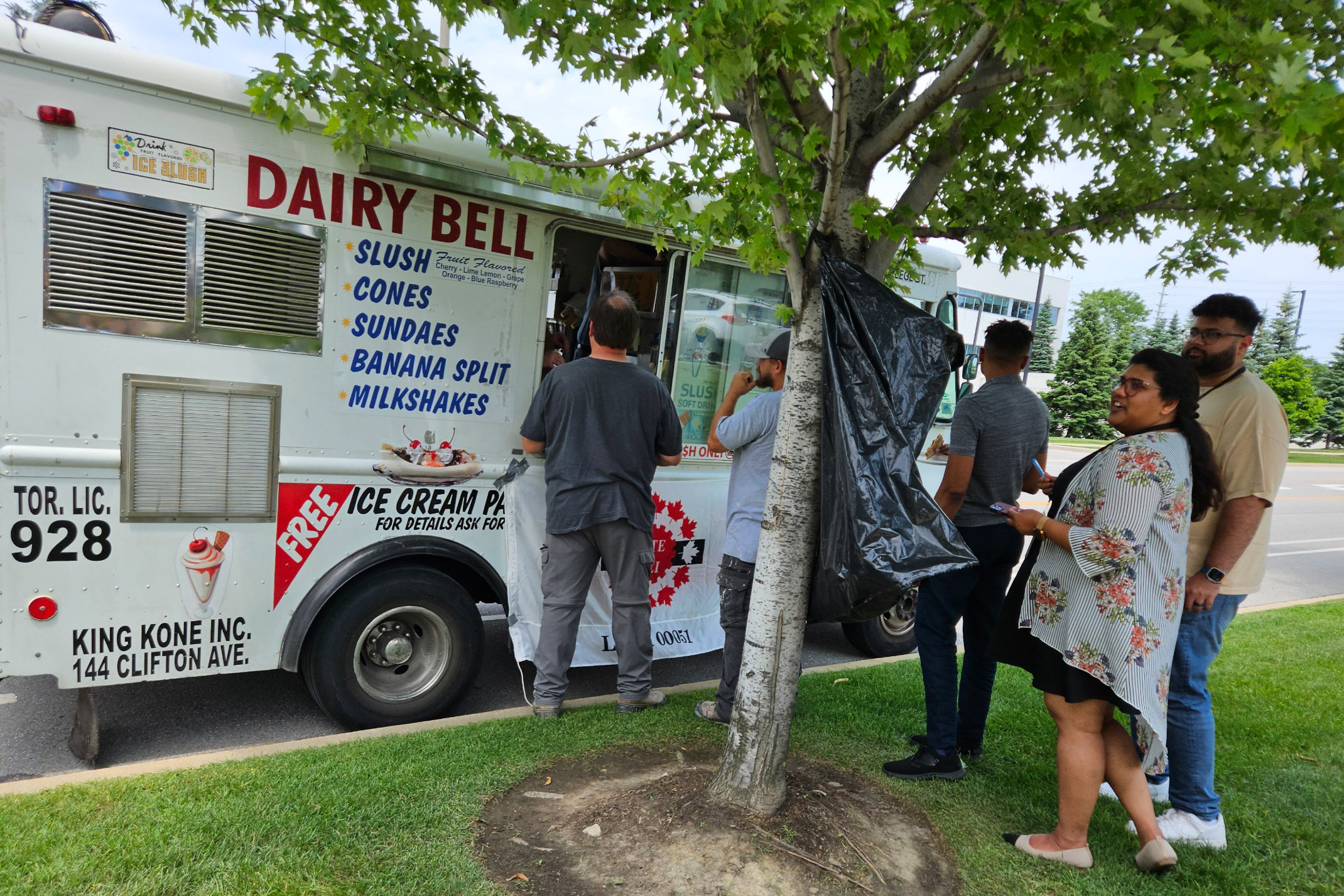 people in front of an ice cream truck