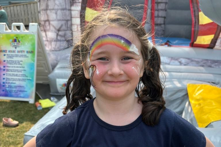 child with face painted