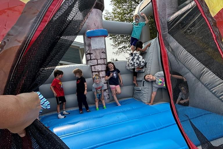children in a bouncy castle