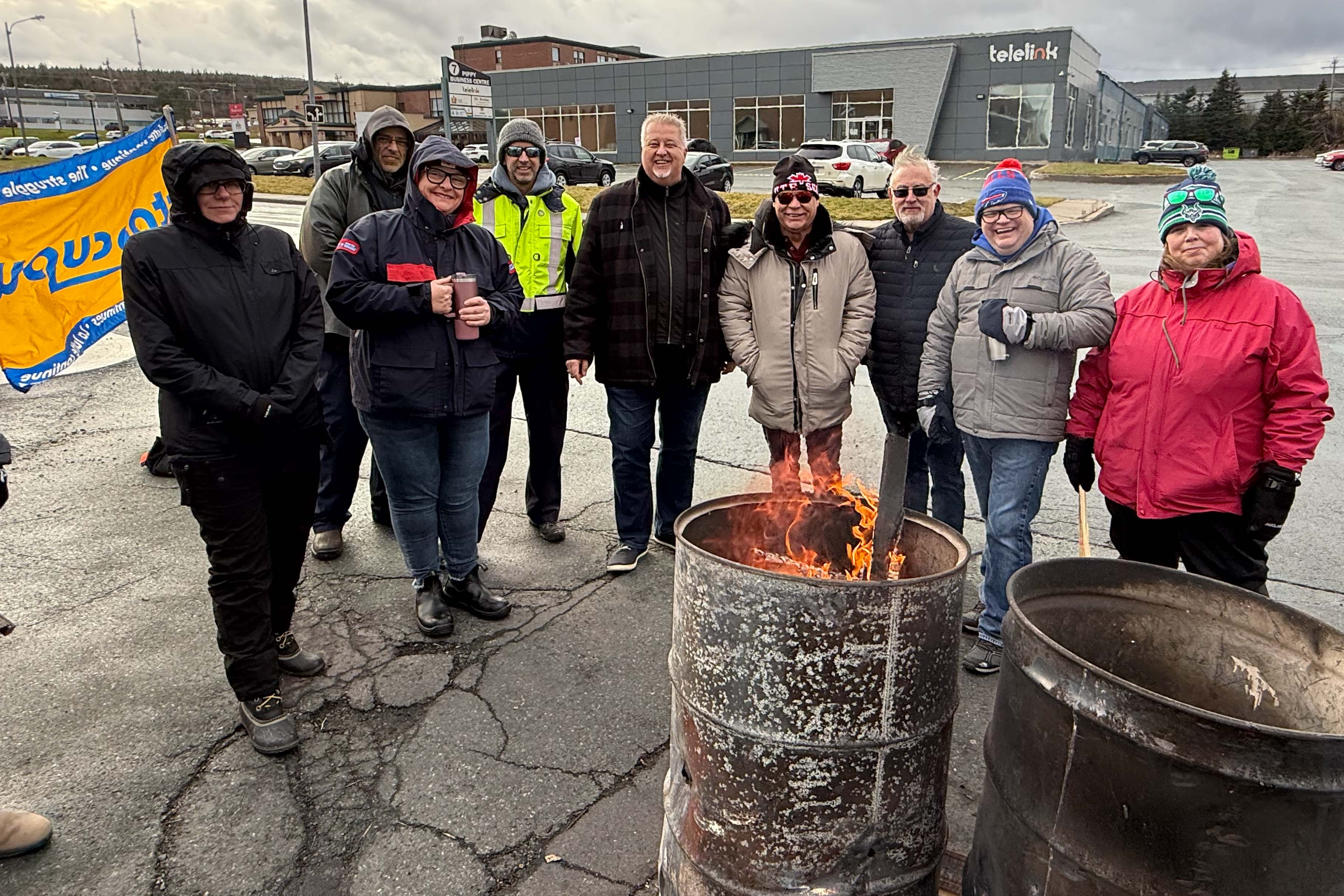 Marc Brière, Doug Gaetz and Brian Oldford with CUPW members