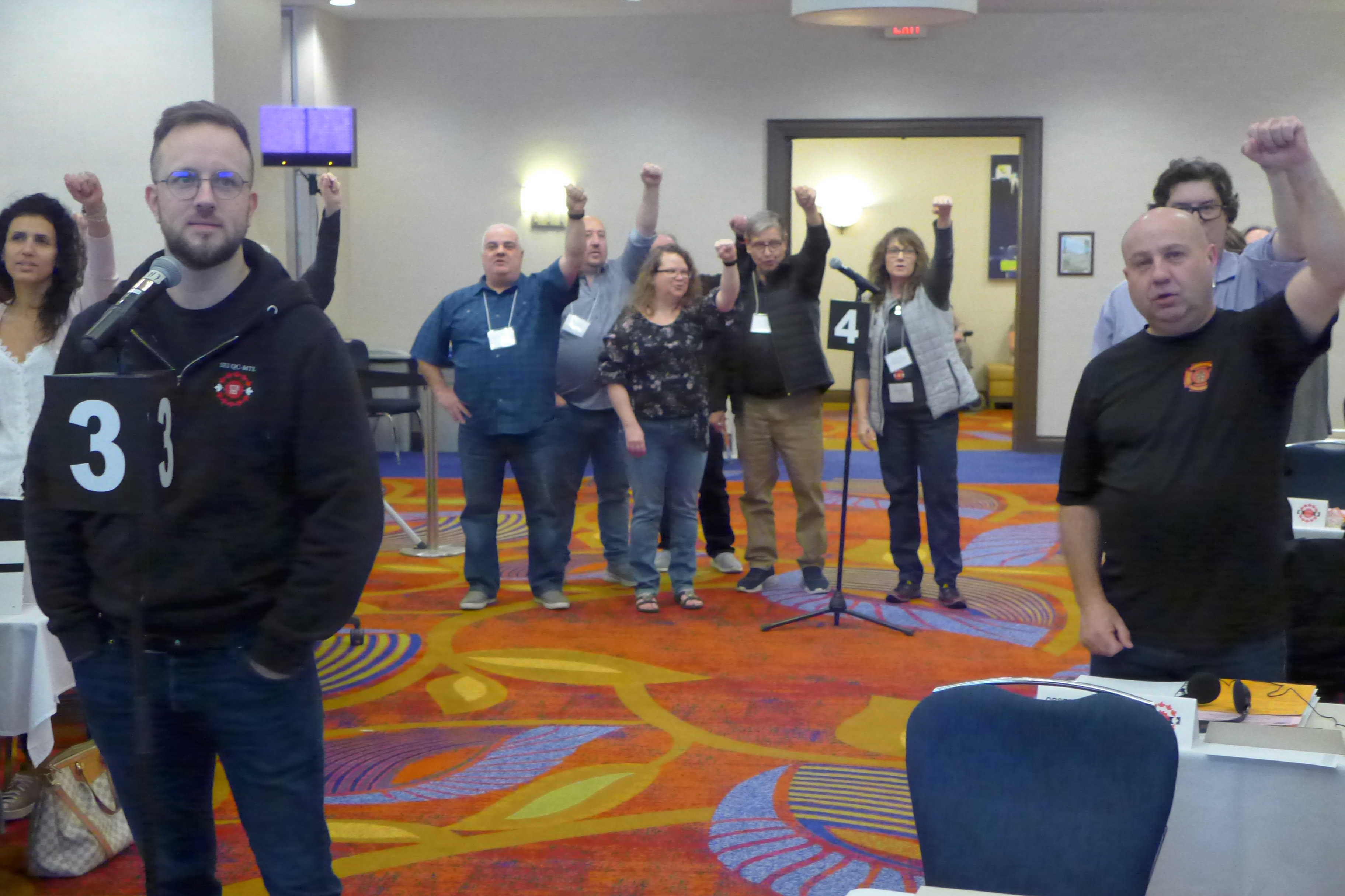 Regional Vice-Presidents at the microphone singing