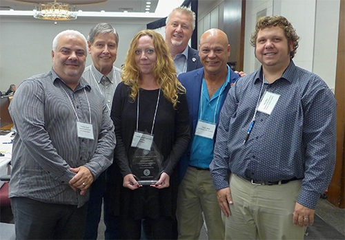 in the photo Cosimo Crupi, Gary Esslinger, Jennifer MacPherson, Marc Brière, Doug Gaetz, Ken Bye 