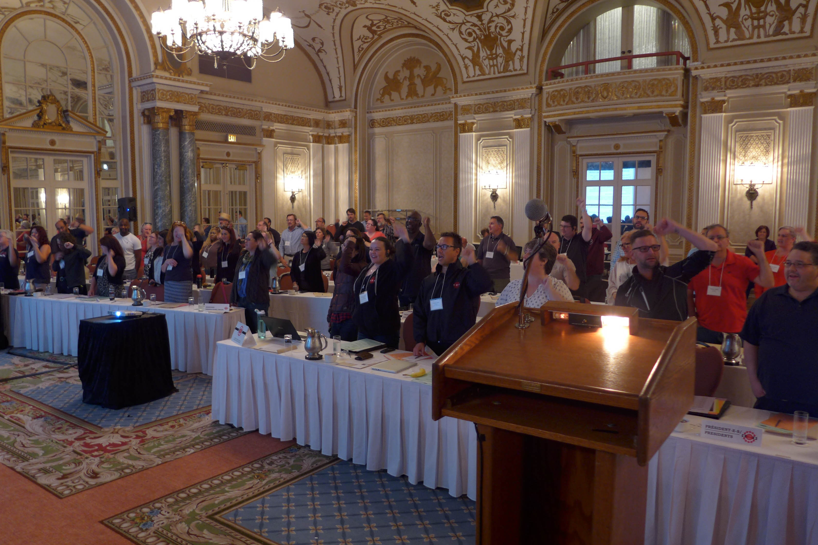 Participants signing Solidarity Forever