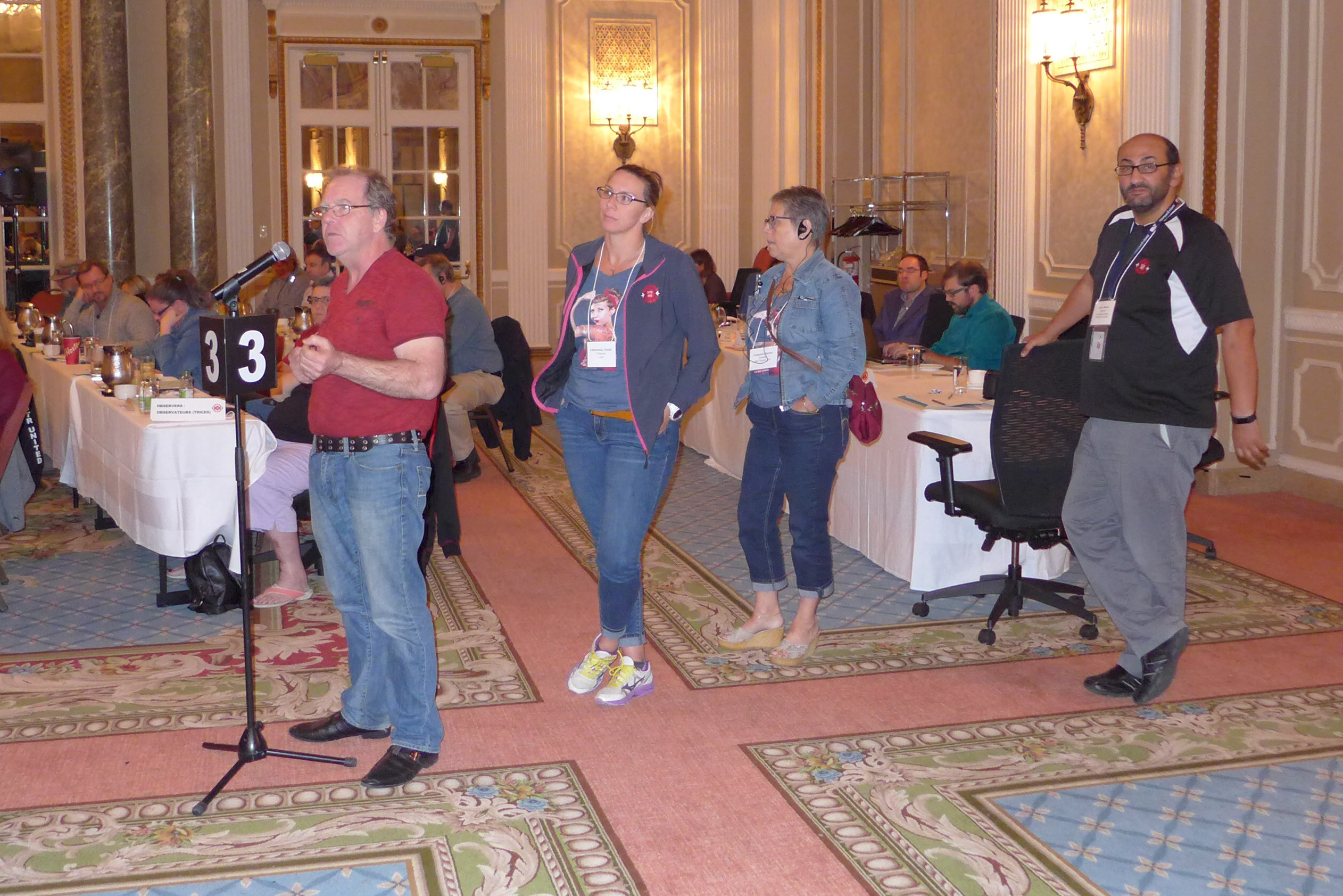 Presidents waiting their turn to speak at the microphone