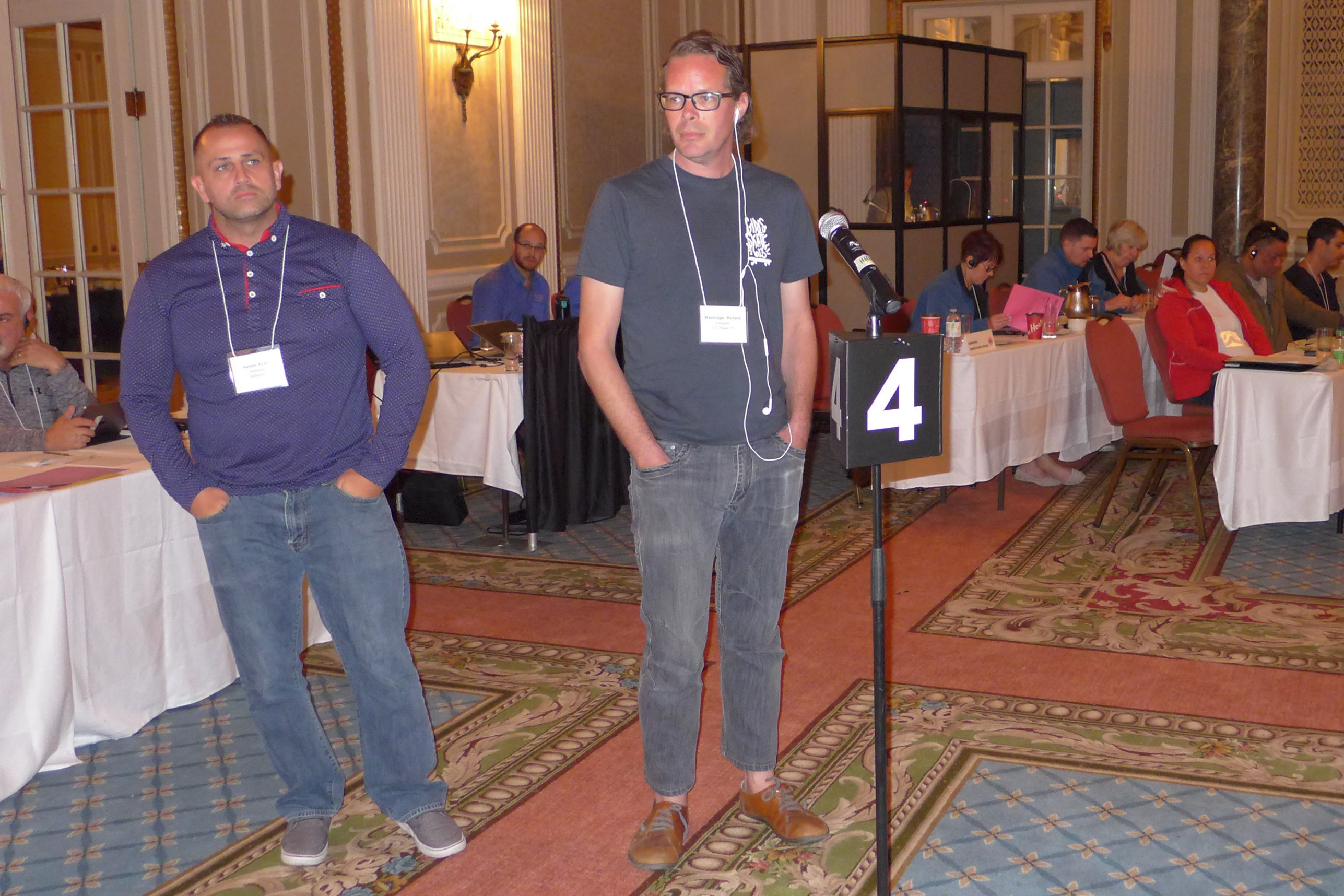 Presidents waiting their turn to speak at the microphone