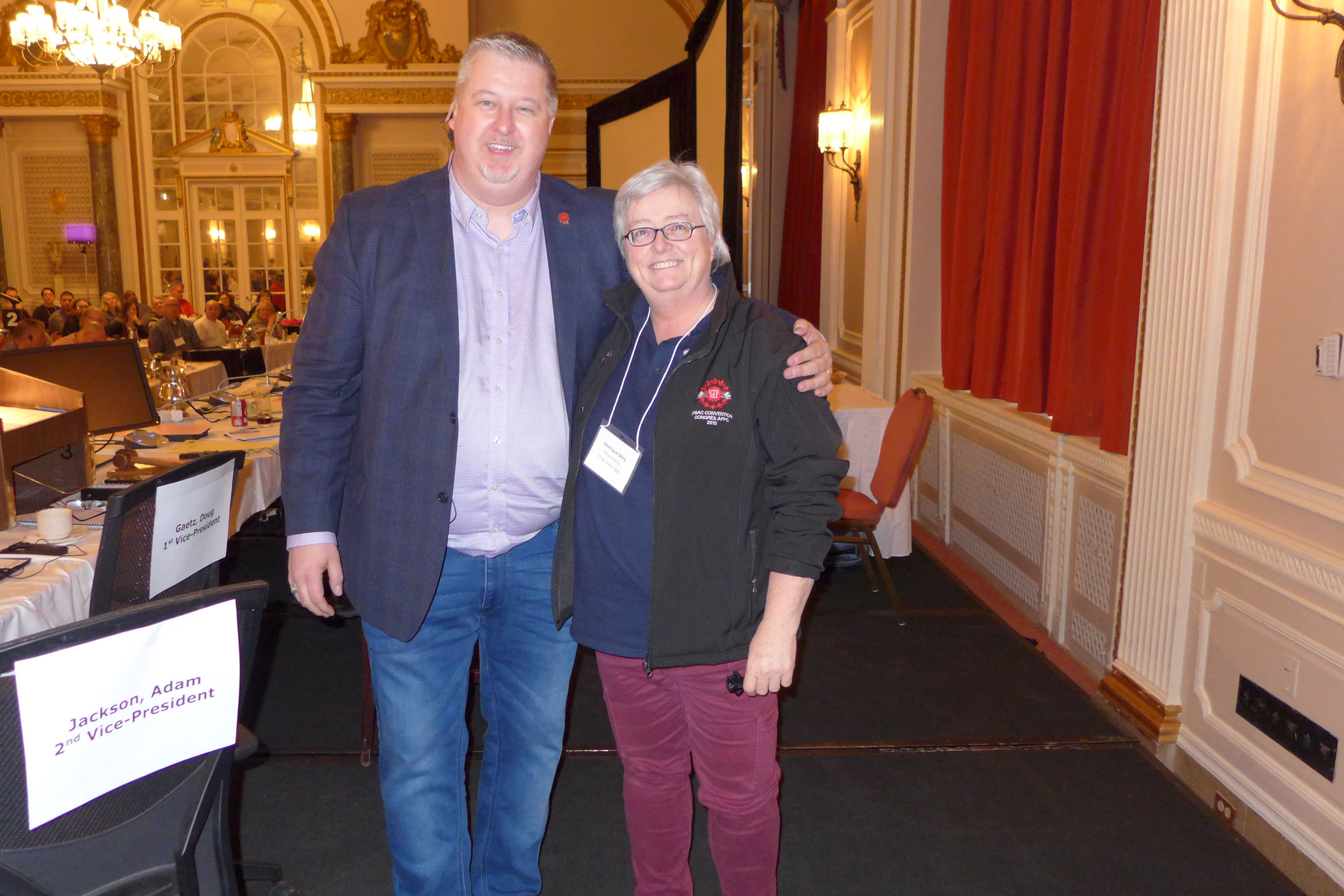 Marc Brière, National President presents Monique Déry with a service pin