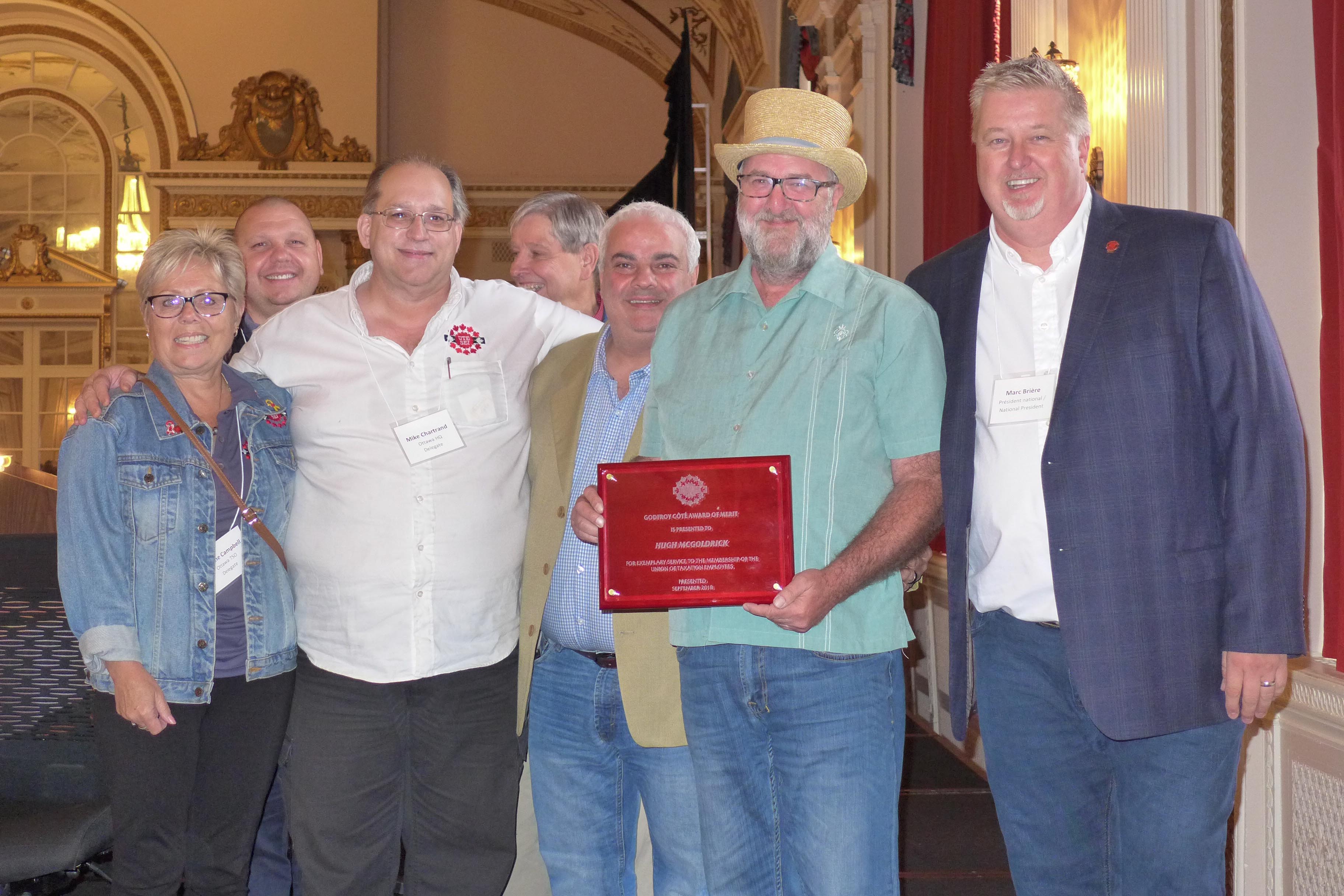 Hugh McGoldrick receives the Godfroy Côté Award of Merit