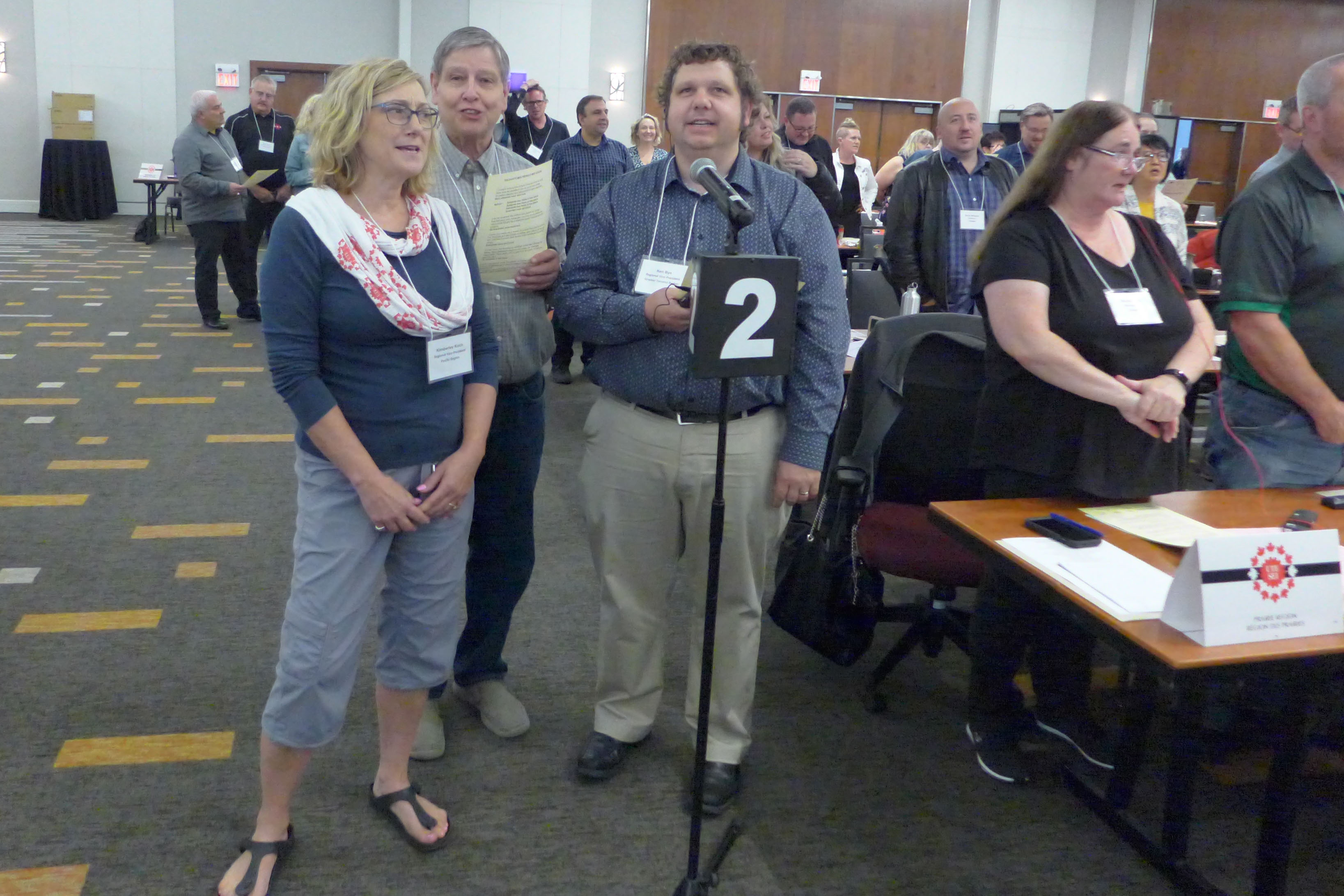 Kim Koch, Gary Esslinger and Ken Bye singing Solidarity Forever
