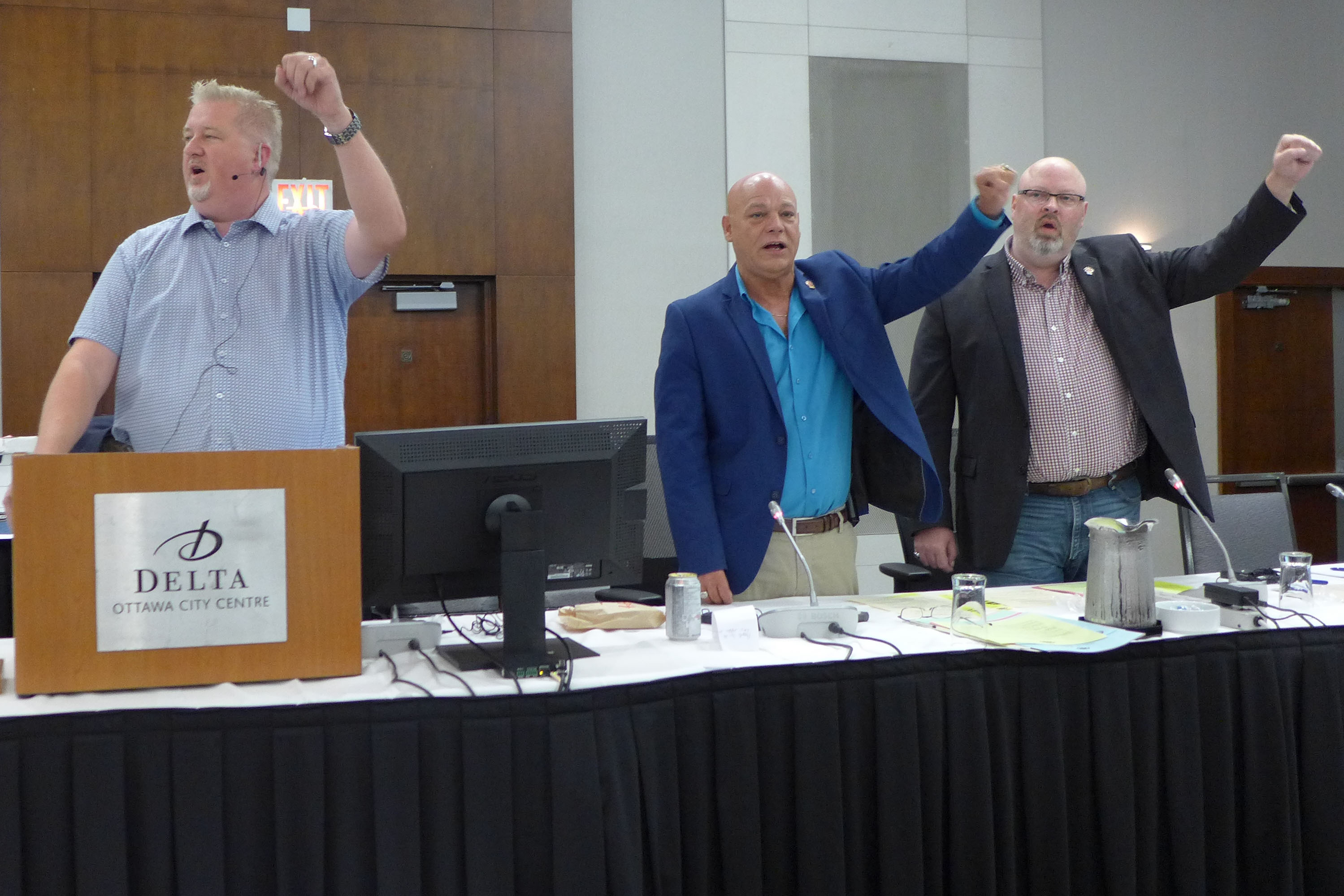 Marc Brière, Doug Gaetz and Adam Jackson singing Solidarity Forever