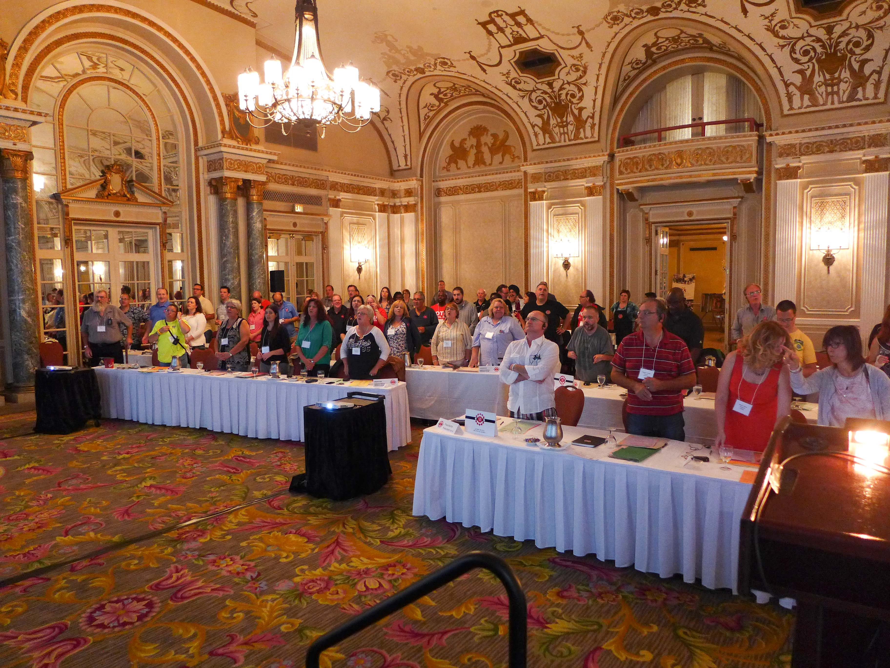 Presidents and observers singing Solidarity Forever