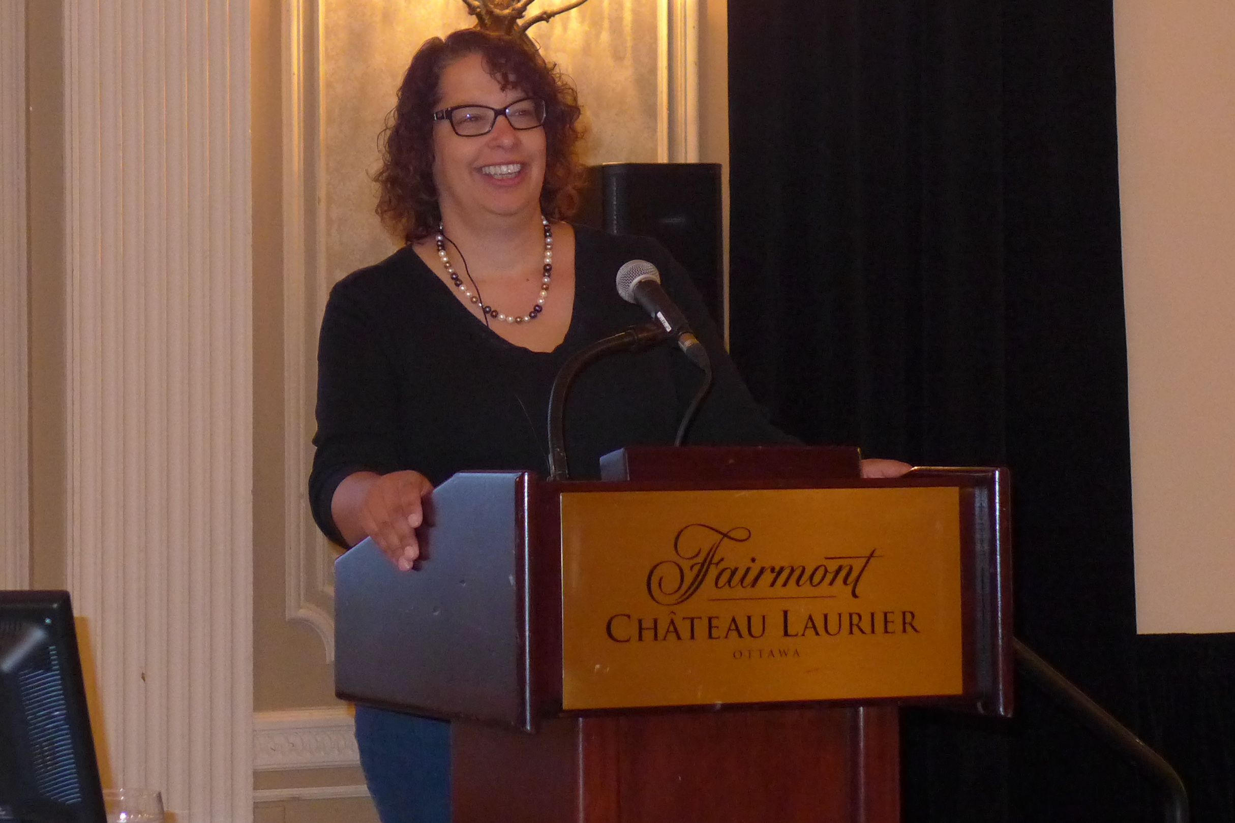 Edith Bramwell, PSAC, Coordinator Representation Section, giving a presentation on Political Activities of Members