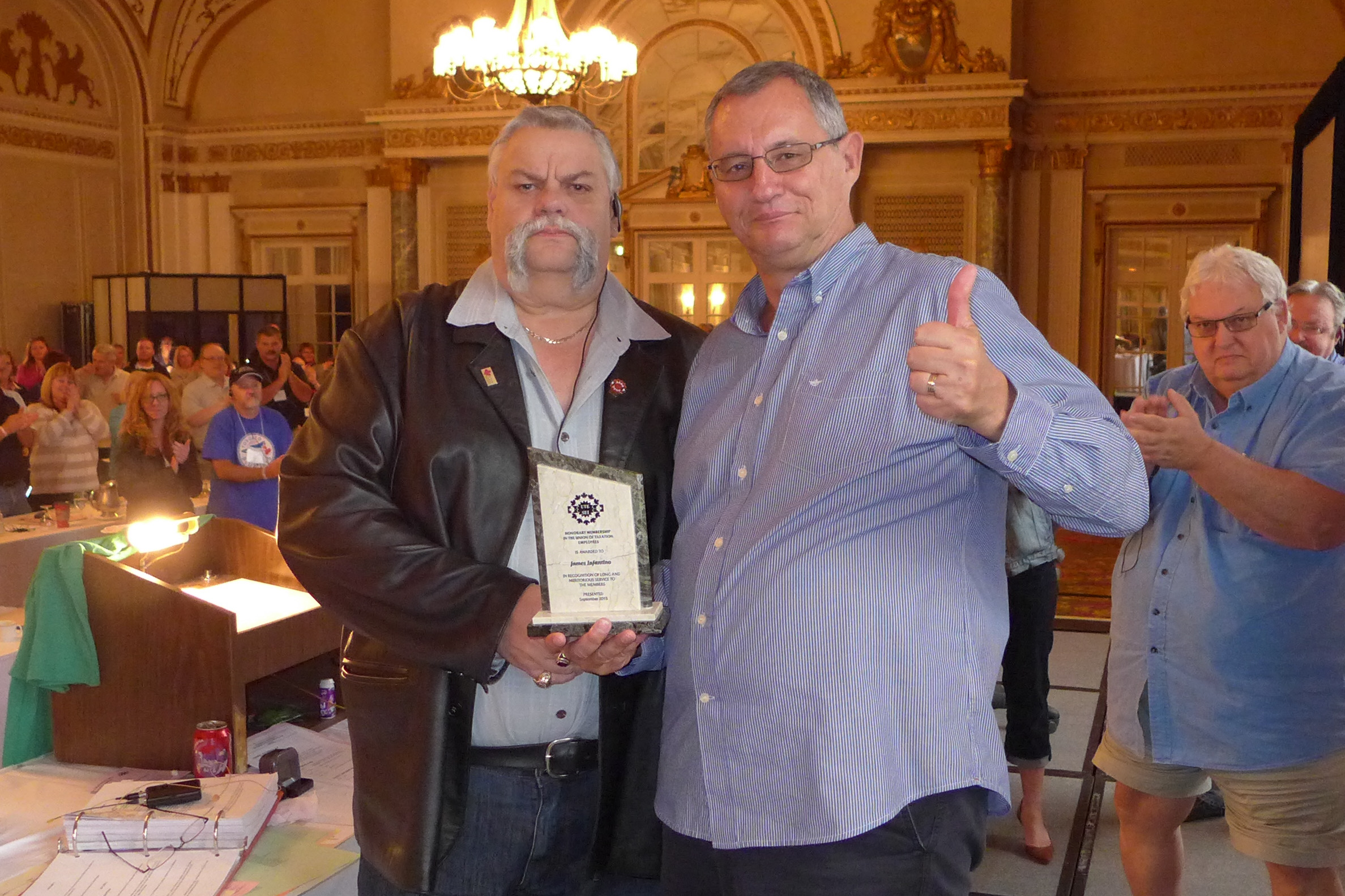 Robert Campbell and James Infantino. James Infantino is awarded Honorary Membership in UTE