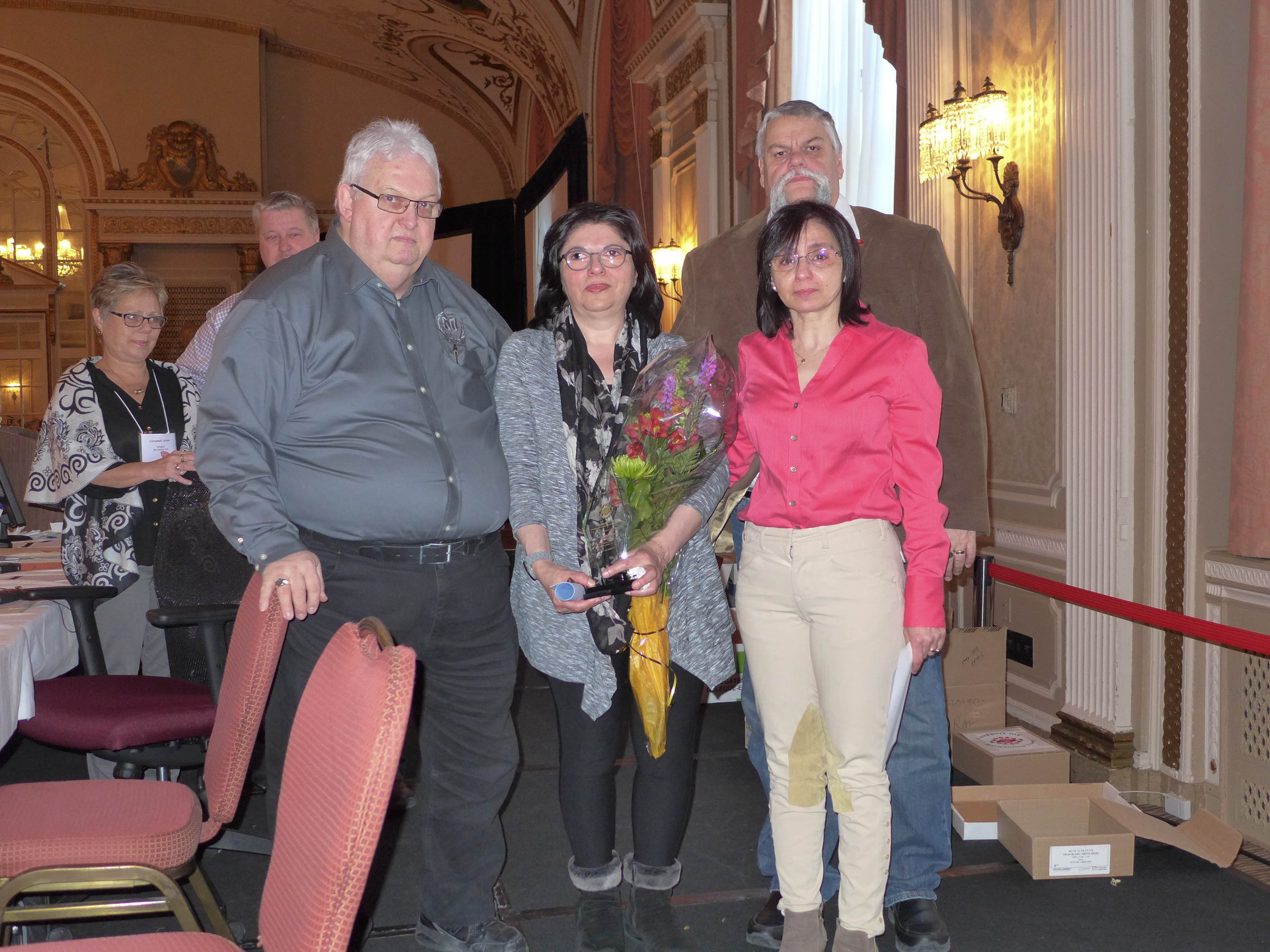 Sabri Khayat received the honorary title of Life Member posthumously.  His wife, Lina Zoobi accepted the award.  In the photo: Denis Lalancette, Lina Zoobi, Dounia Chahla and Robert Campbell