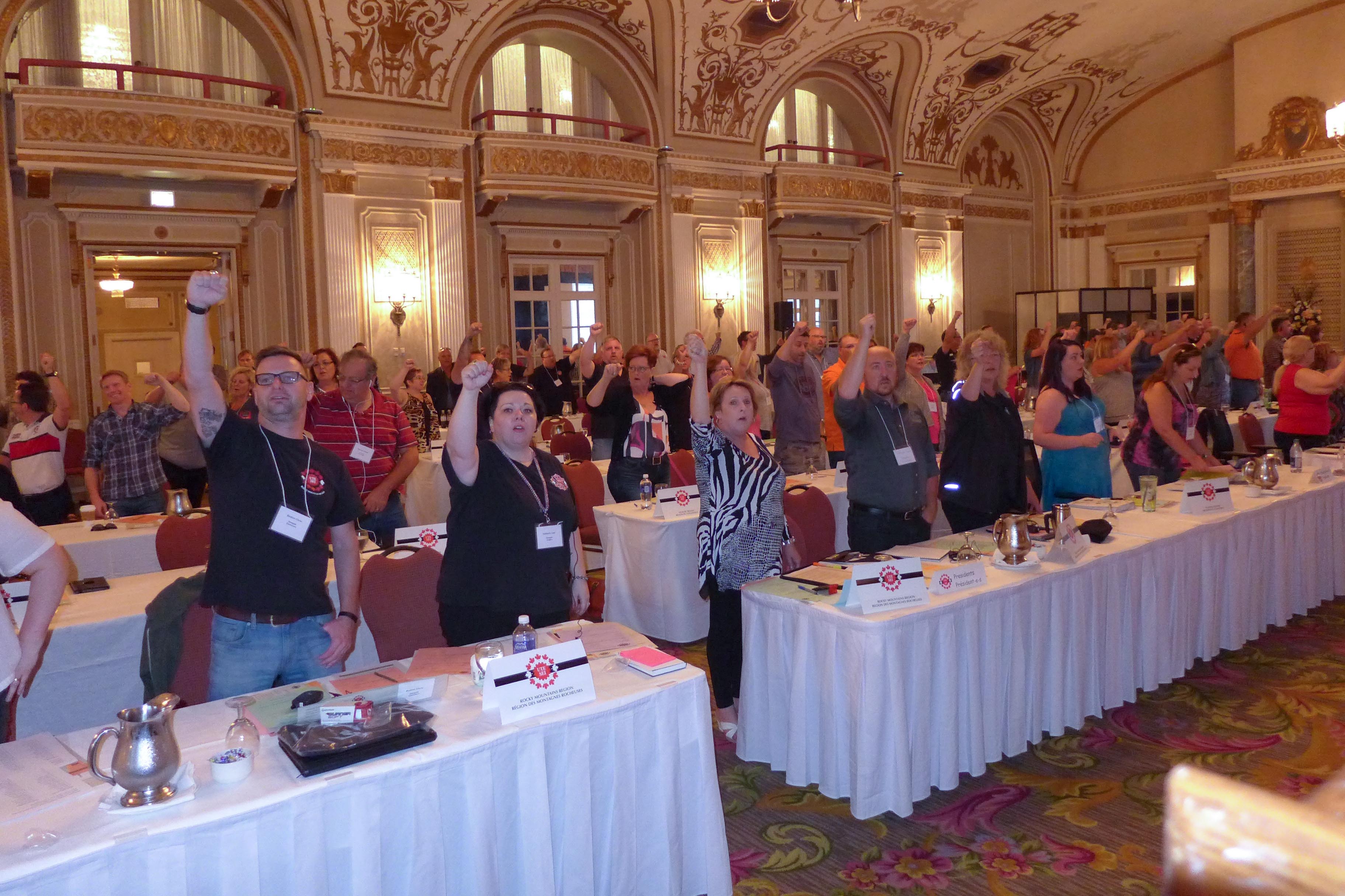 Presidents and observers singing Solidarity Forever