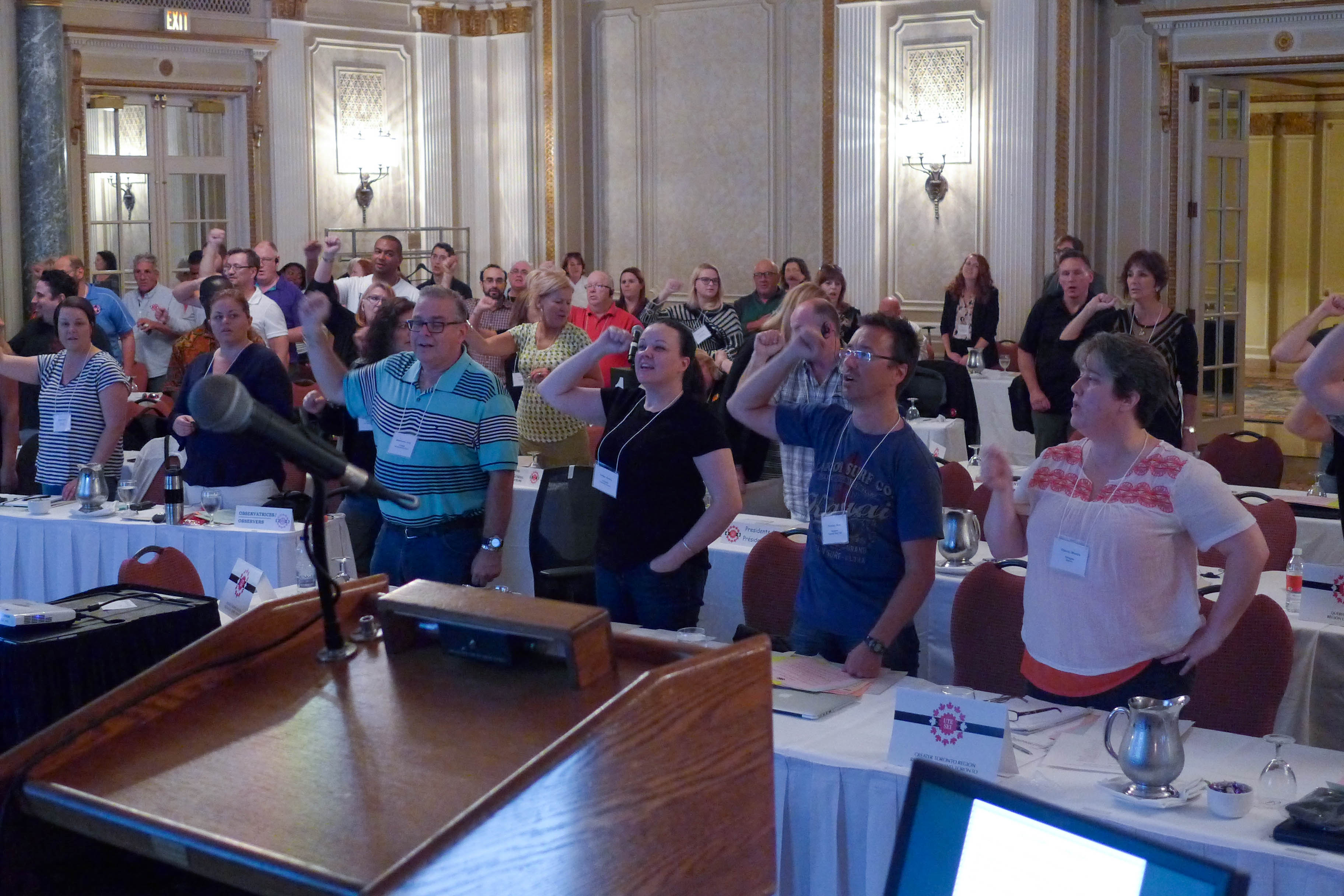 Presidents and observers singing Solidarity Forever