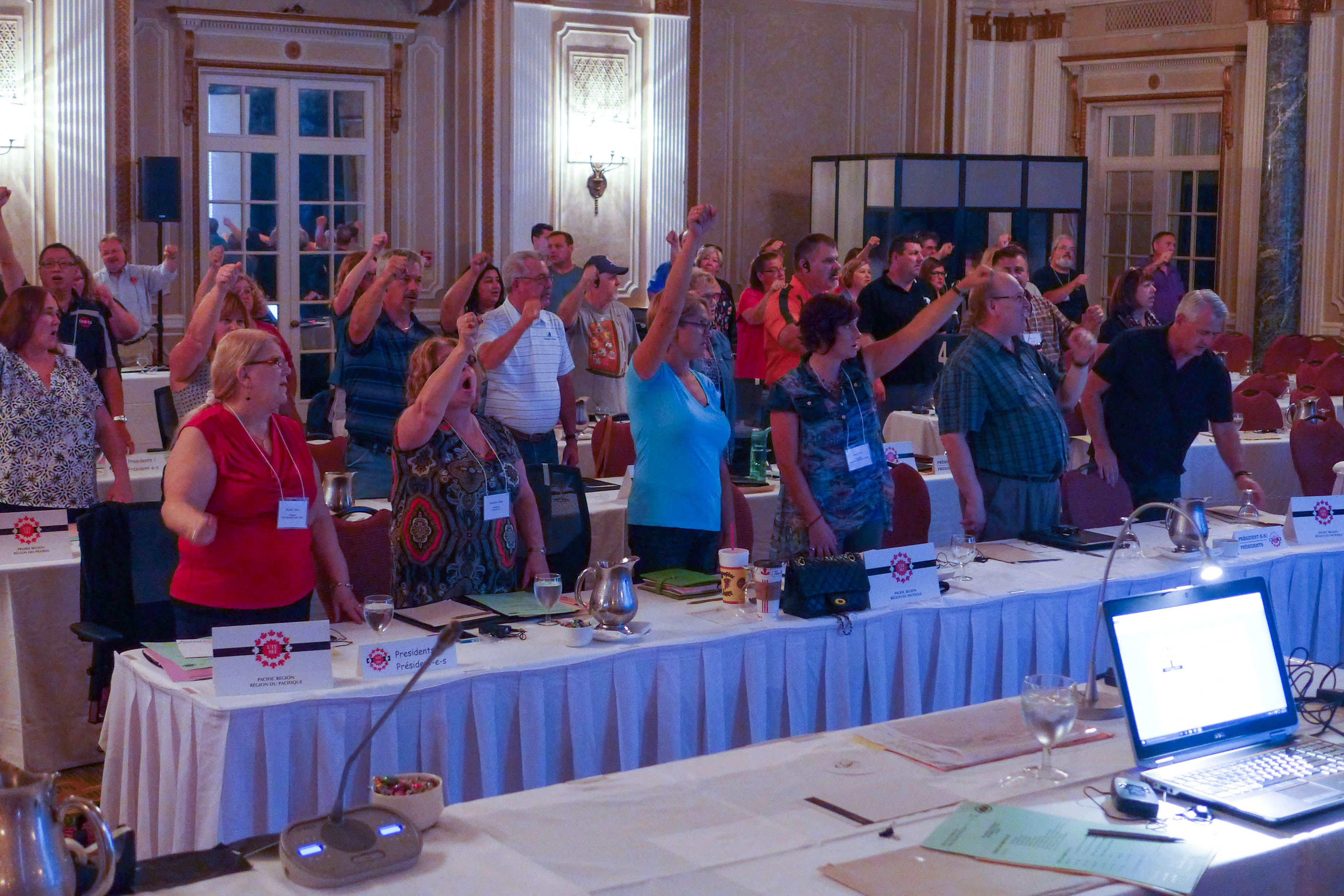 Presidents and observers singing Solidarity Forever