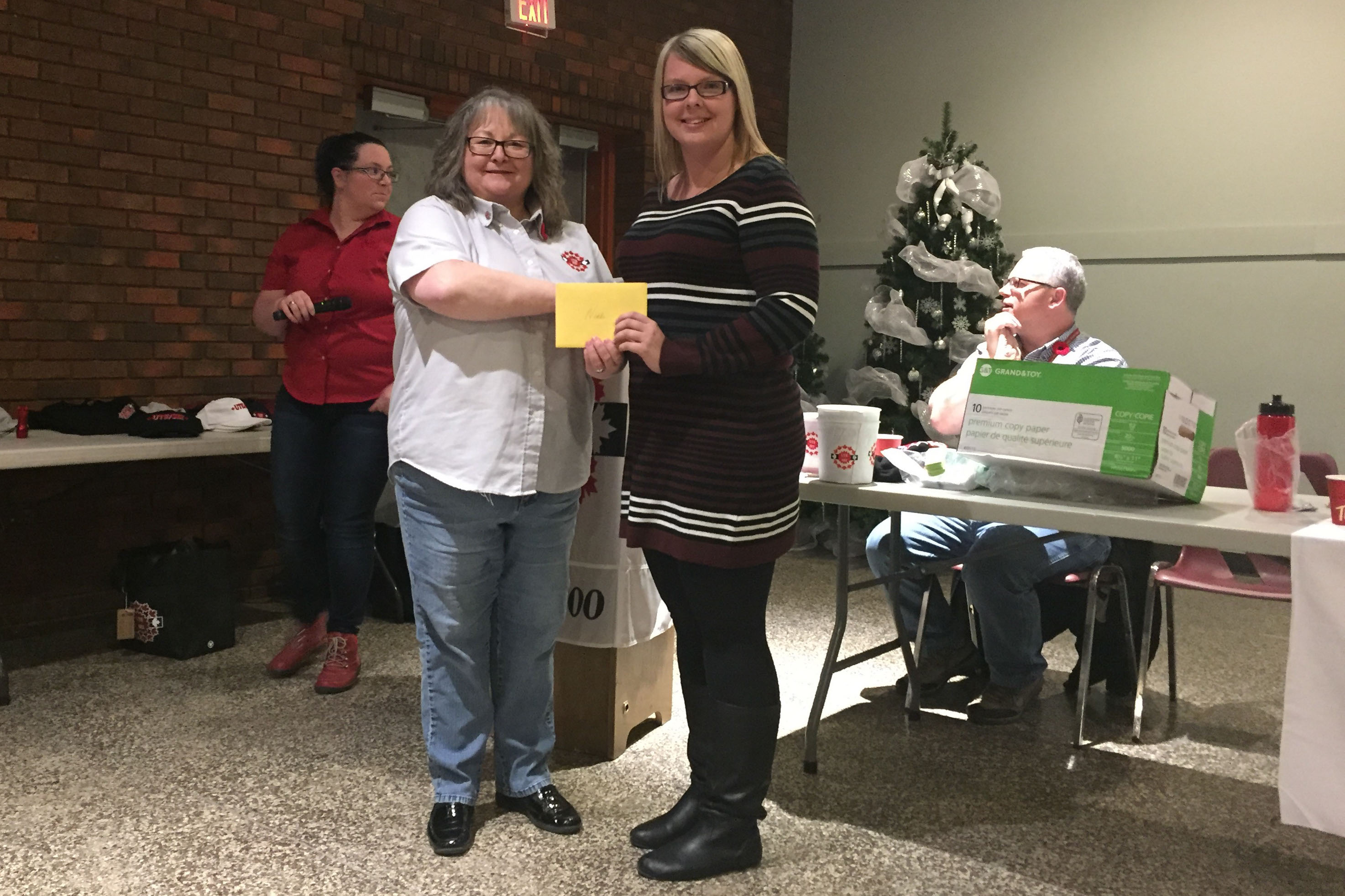 Madonna Gardiner presenting the "Sister Madonna Gardiner Scholarship Award" to Nikki Doyle