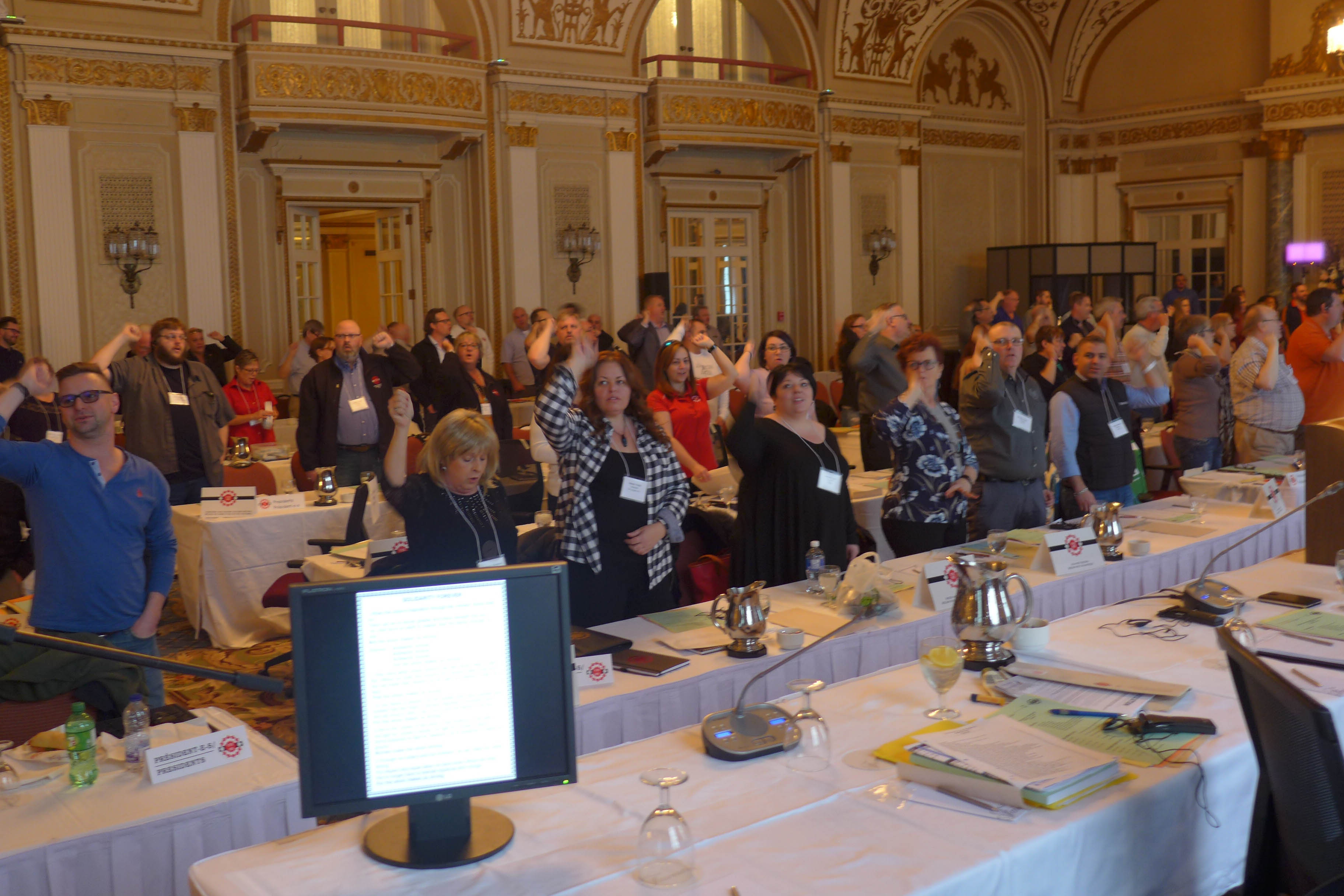 Presidents and observers singing Solidarity Forever