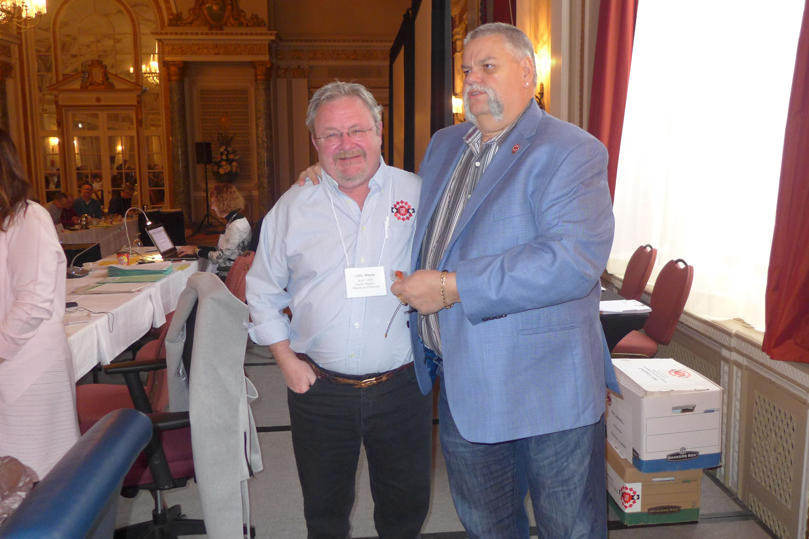Wayne Little receives his 25 year pin from Robert Campbell